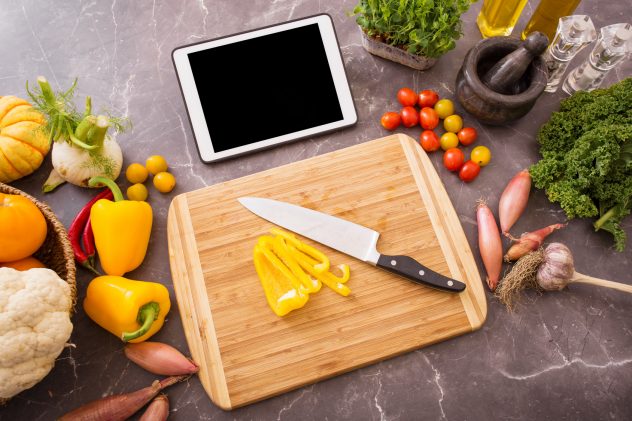 Tablet in kitchen for food recipe