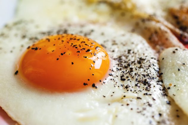 Fried eggs with black pepper
