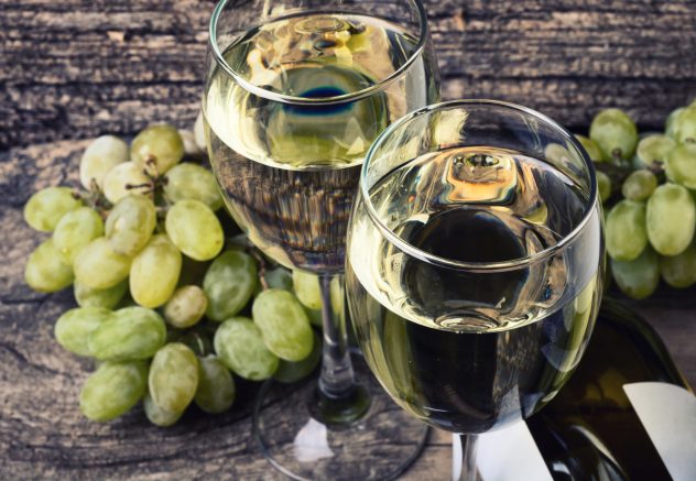 Bottle of white wine grapes grape alcohol drink