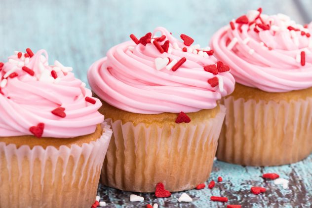 Pink Valentines Day cupcakes with sprinkles