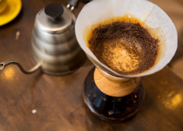 close up of coffeemaker and coffee pot making pour over