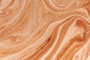 Varoitus: Tämä kahvimainos saa sinut haukottelemaan hallitsemattomasti chocolate and milk mixing texture background #3 coffee