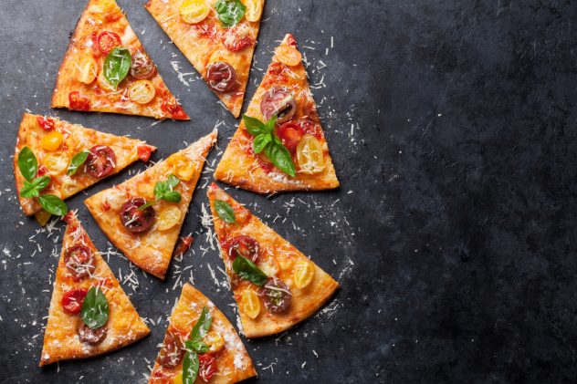 Pizza with tomatoes, mozzarella and basil