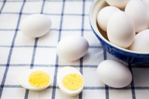 white eggs in a blue bowl