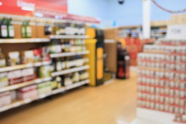 wine shelves in supermarket blurred background alcohol market