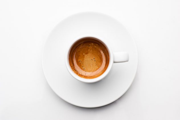 top view a cup of espresso coffee isolated on white background coffee