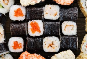 Set of sushi, maki, gunkan and rolls with salmon japanese food