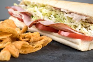 Footlong sandwich and chips subway bread restaurant