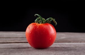 tomato on a black background