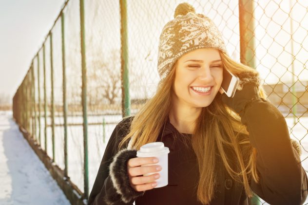 woman phone coffee mug takeway