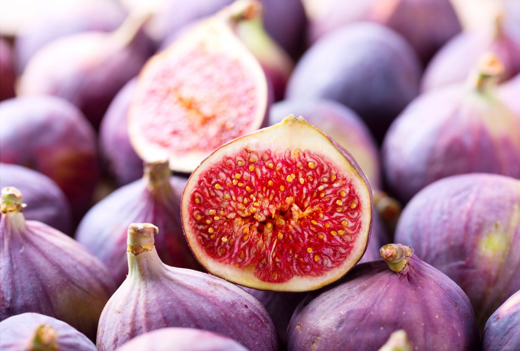 fresh fruit figs as background