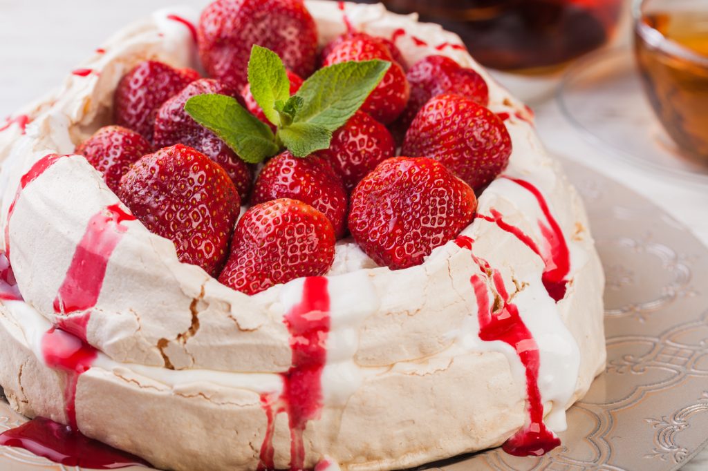 Pavlova cake with fresh strawberries