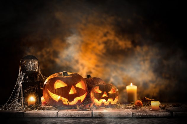 Halloween Pumpkins on old wooden table