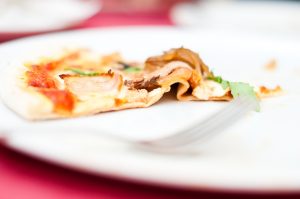 last slice of pizza on plate