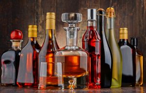 5 maailman koukuttavinta ainetta – tämä selittää miksi nikotiinista on niin vaikea päästä eroon Bottles of assorted alcoholic beverages