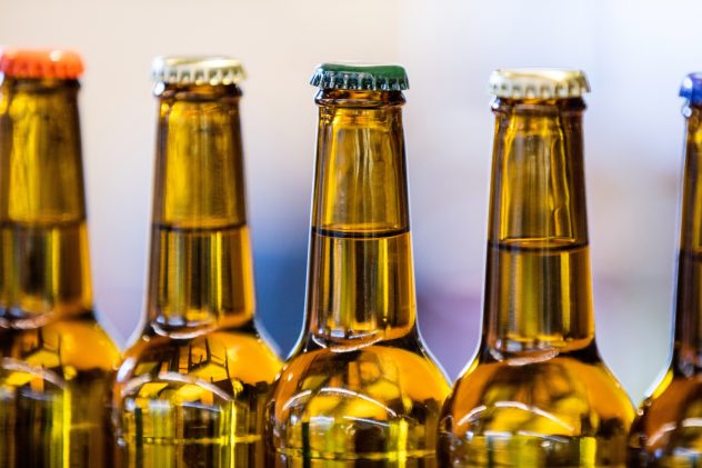 Close-up of sealed beer bottles