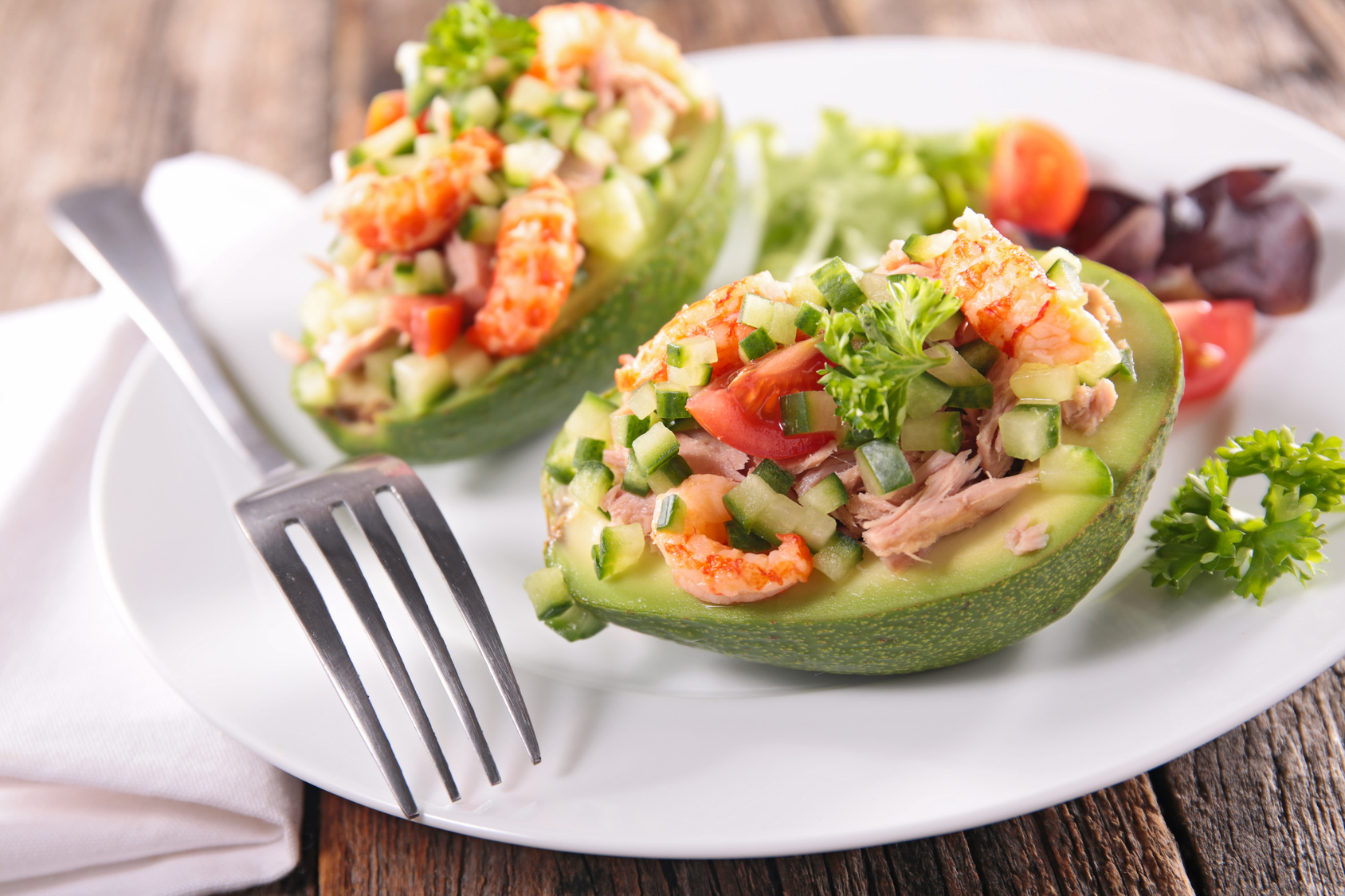 salad in avocado bowl