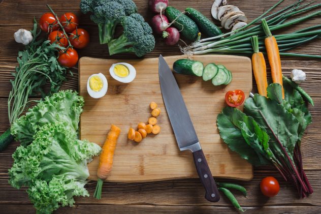 Healthy food and ingredients on rustic wooden background