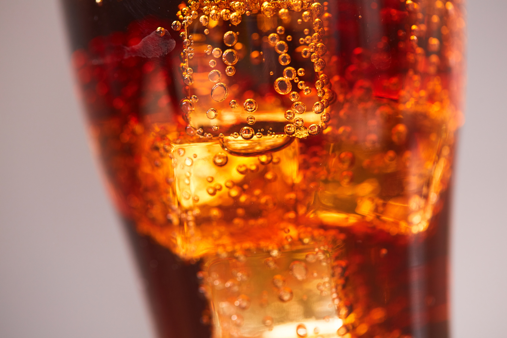 cola with ice closeup